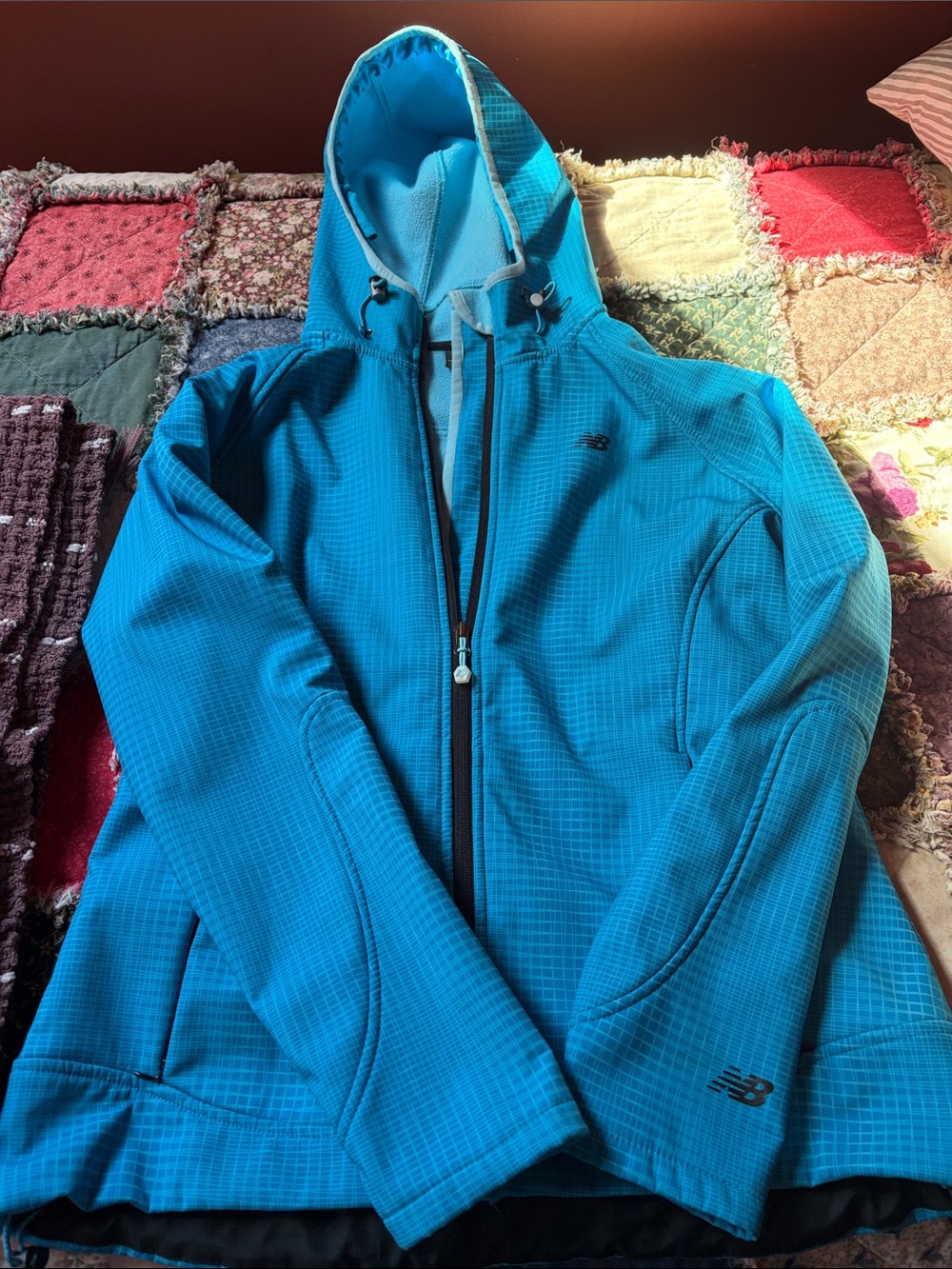 New Balance Women's Teal Hooded Softshell Jacket. Size medium